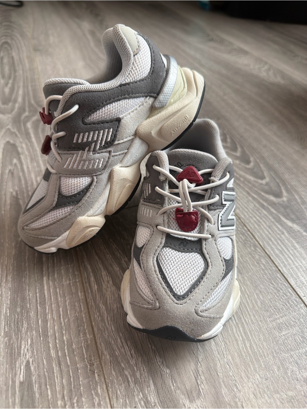 New Balance Kids Gray, White and Red Accent Sneakers